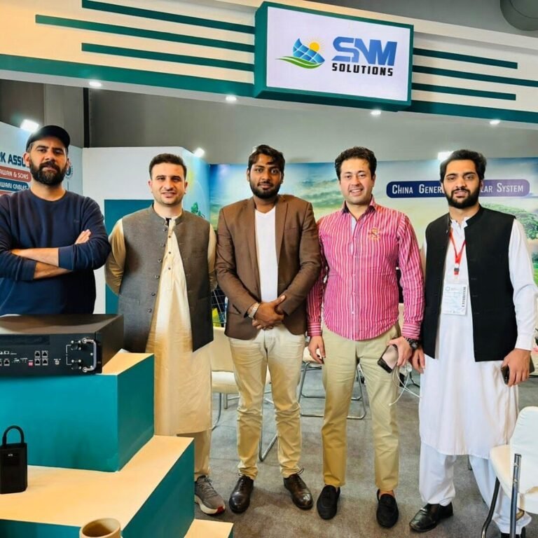 SNM Solutions team at the company exhibition booth