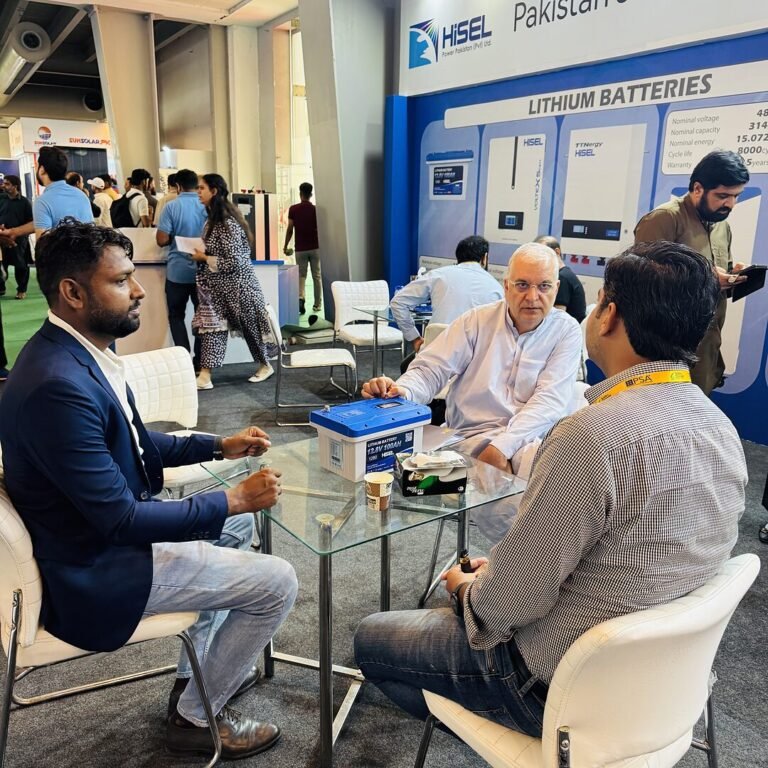 SNM Solutions team in a meeting at a lithium battery stand
